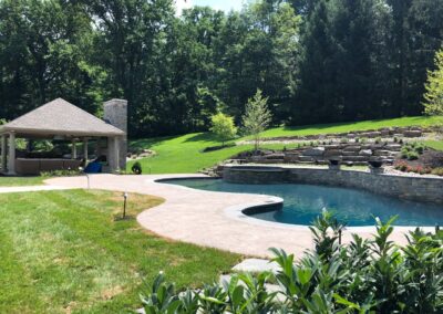 Boulder wall, raised beam, spa