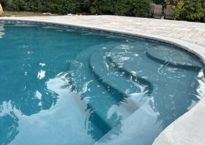 Swimming pool, steps, bluestone