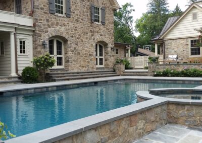 Wall, raised spa, pool