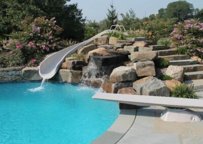 Pool, slide, boulder steps